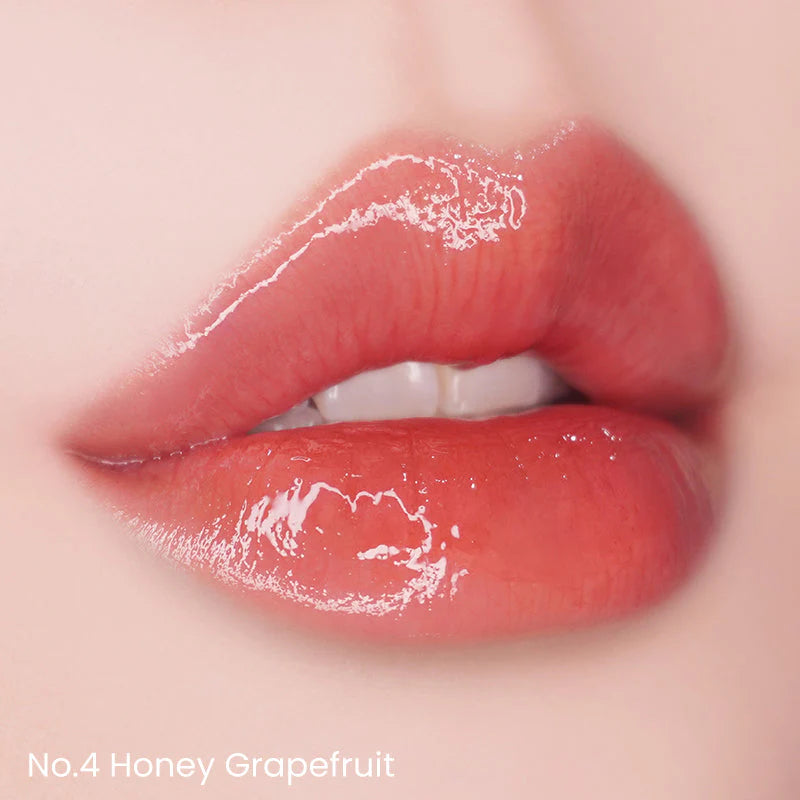 Unleashia - Popcorn Syrup Lip Plumper No.4 Honey Grapefruit - تنت مكبر الشفايف رقم 4 من انليشيا